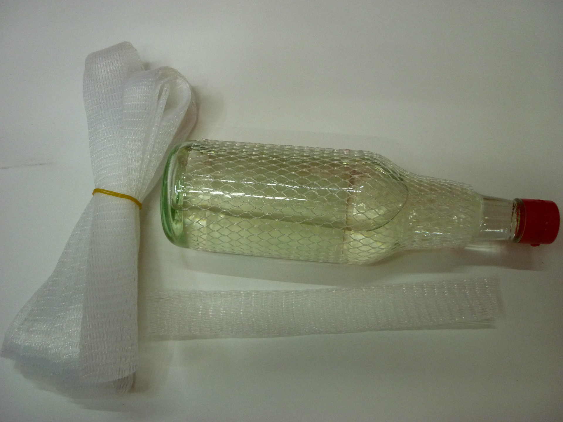 厂家专业定制塑料酒瓶护套网通 PE保护网套 单层通用护套网示例图6