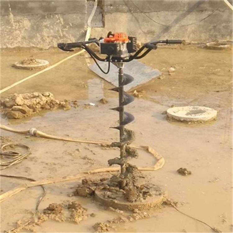 螺旋式挖坑机清桩孔超级简单    便携式螺旋式挖坑机地面打洞新技术图片