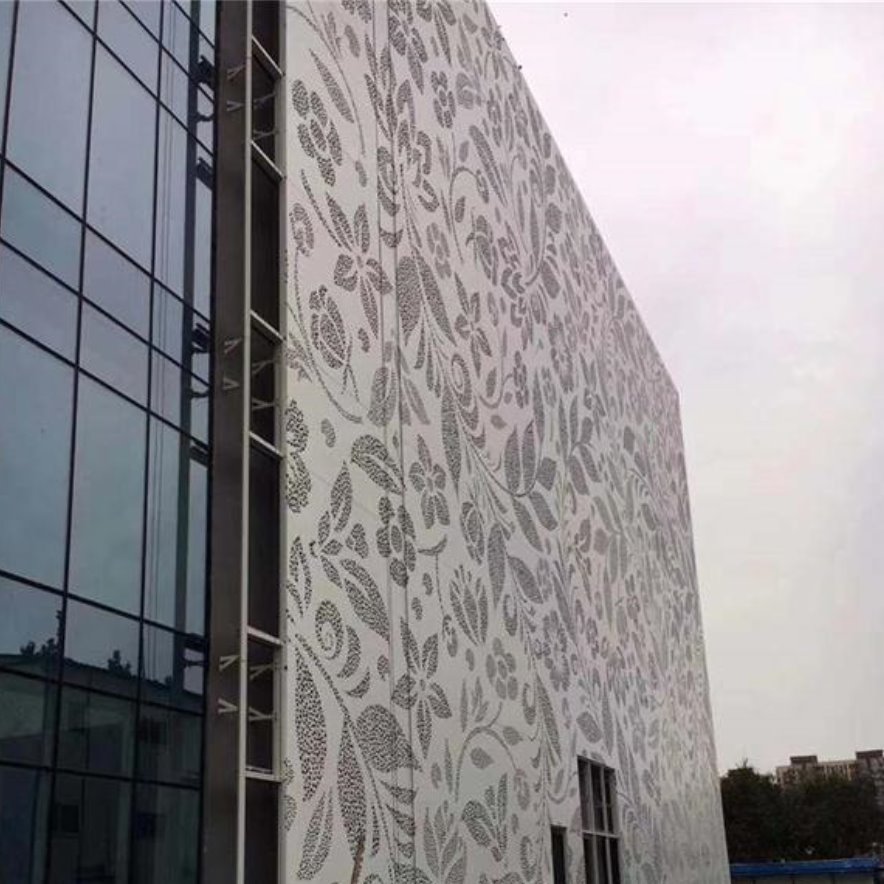 ​国际商贸城艺术镂空雕刻铝单板   雕花氟碳铝板装饰效果   造型铝单板构造特点图片