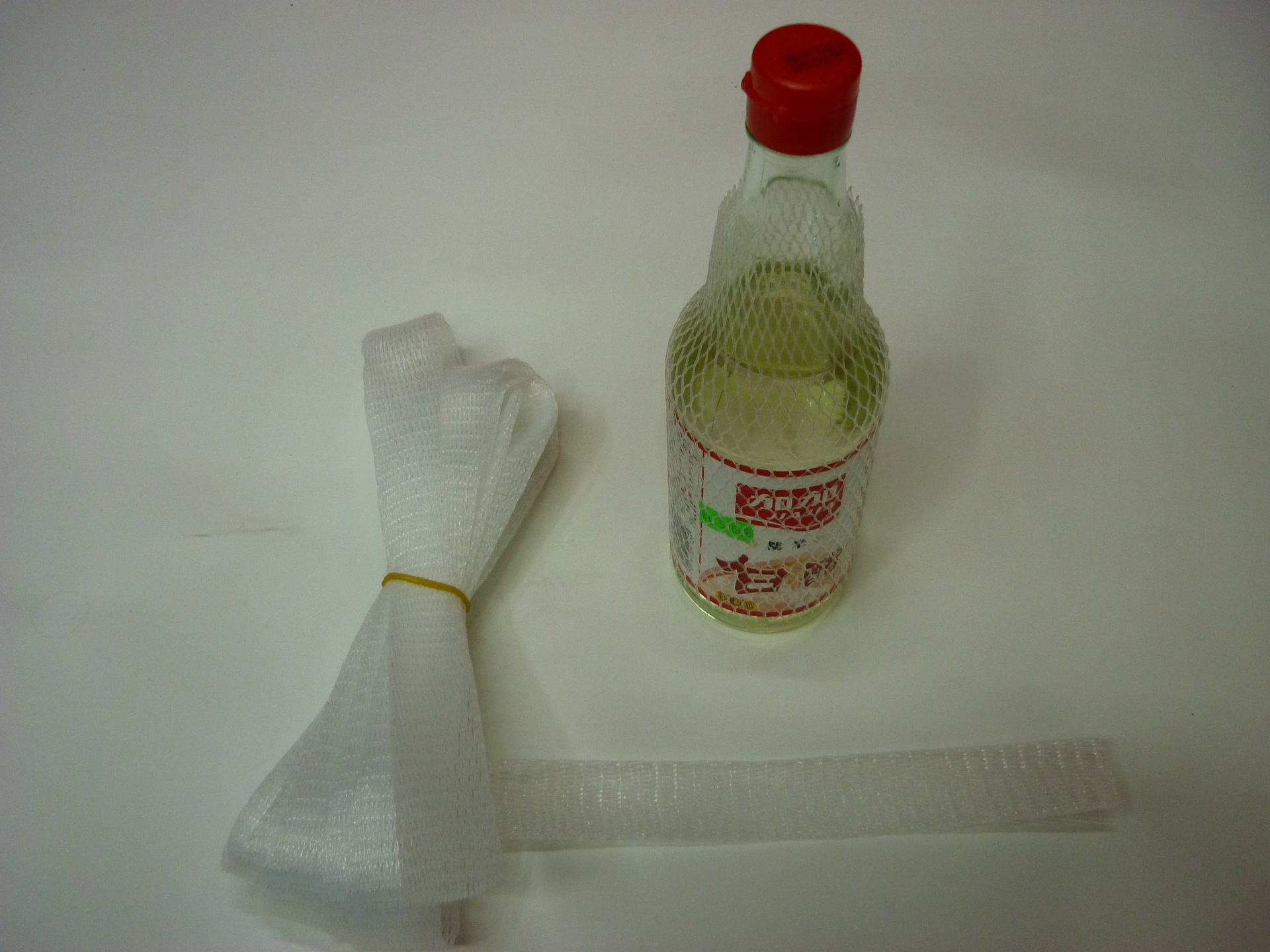 厂家专业定制塑料酒瓶护套网通 PE保护网套 单层通用护套网示例图5