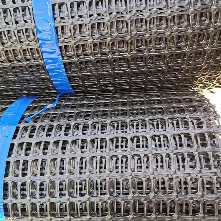 朔涵 双向拉伸塑料土工格栅 养殖网自粘式玻纤钢塑复合格栅 公路路基厂家图片